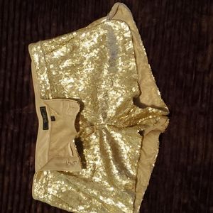 Gold sequenced shorts by Jessica Simpson